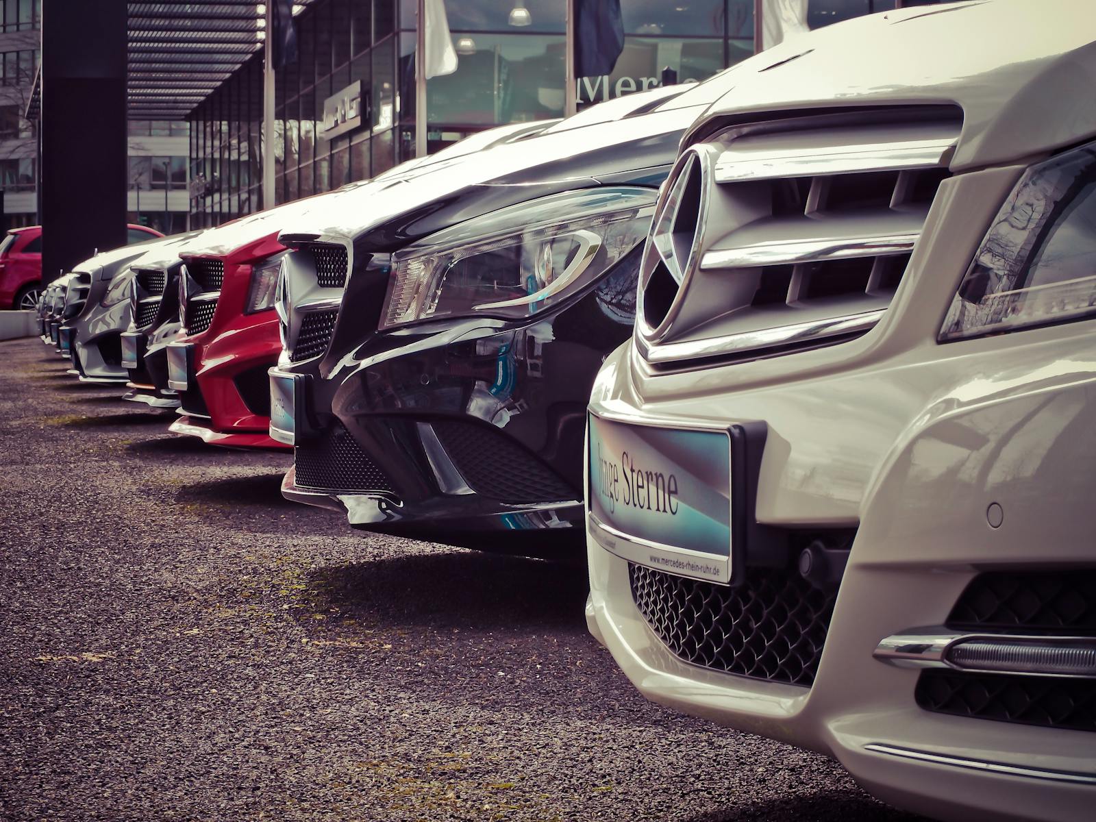 Mercedes Benz Parked in a Row, auto insurance