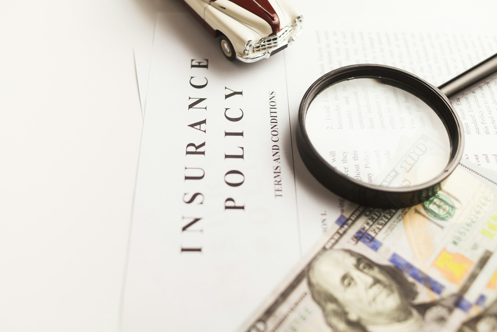 a magnifying glass sitting on top of a piece of paper, home